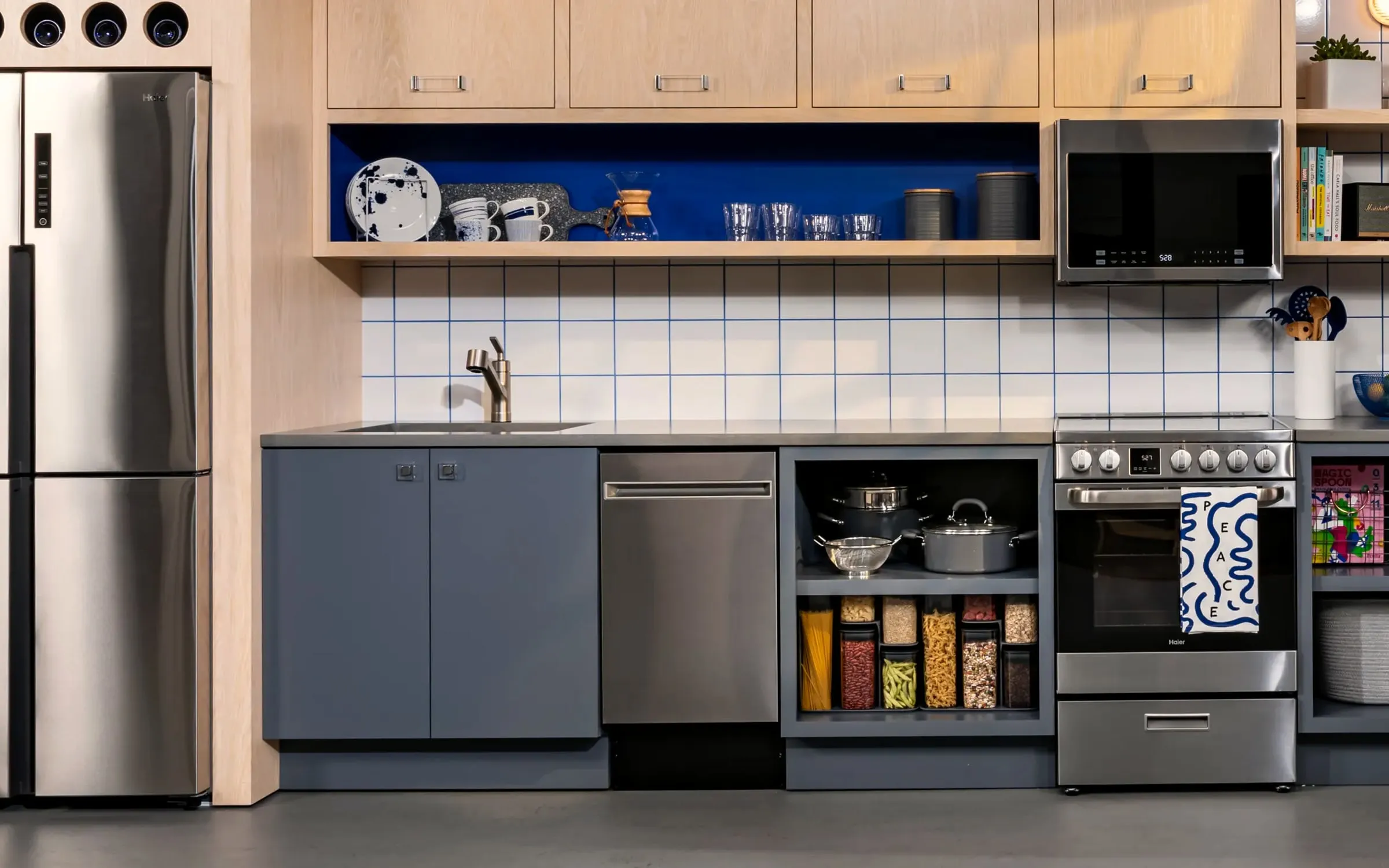Haier dual-zone wine cooler with rear panel off showing thermoelectric module and heat sink during diagnostic in Anaheim CA