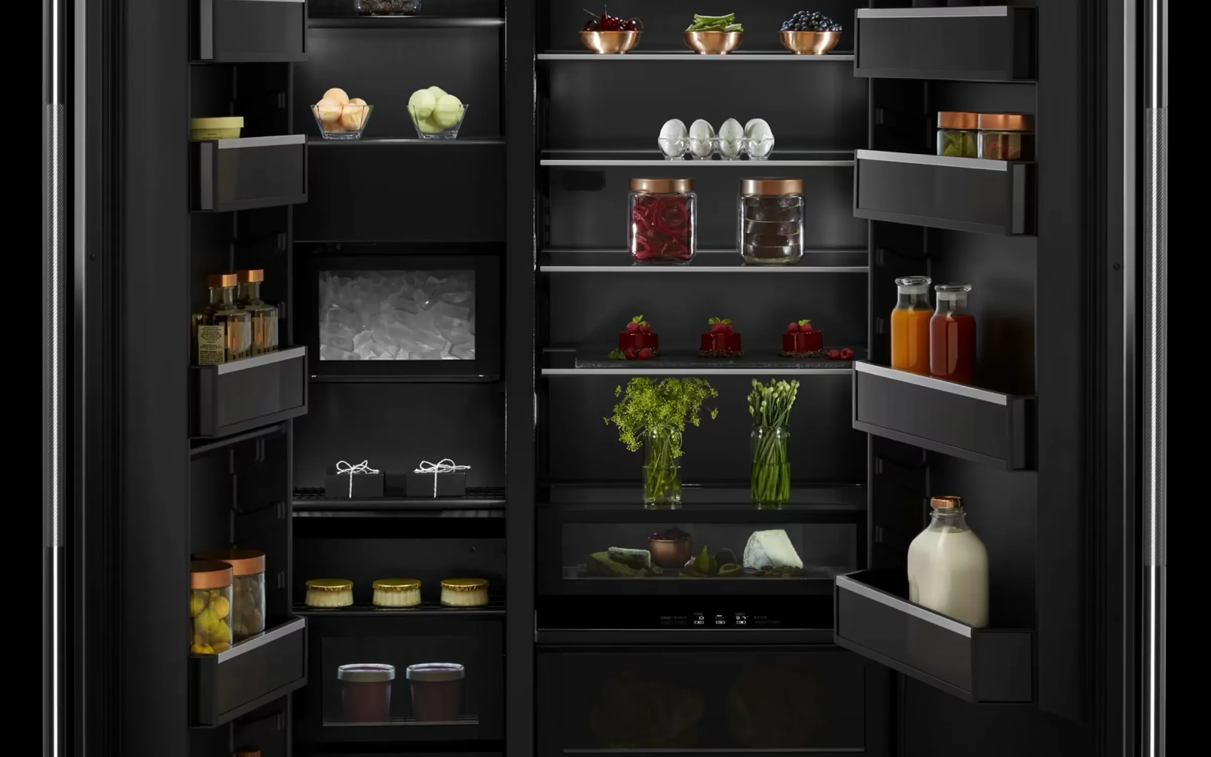 JennAir NOIR dark-finish built-in refrigerator in a modern kitchen