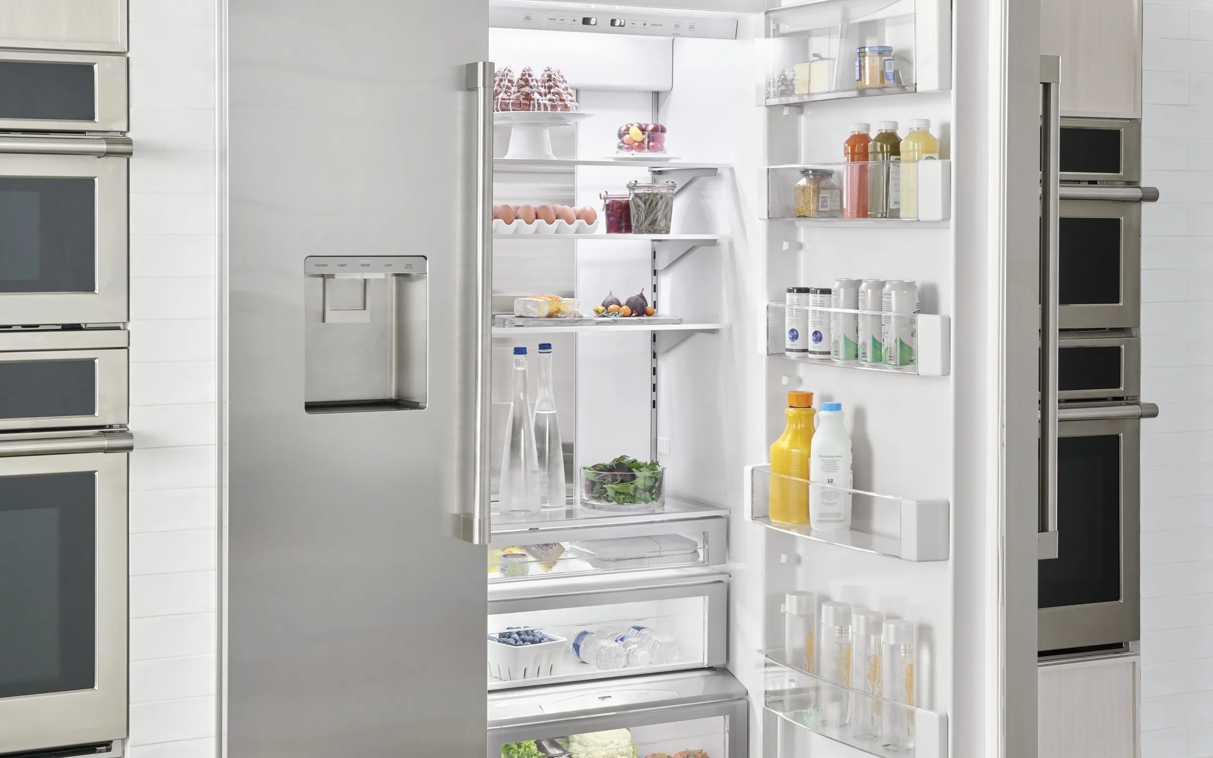 Monogram Statement series built-in refrigerator with rear water valve access during diagnostic in Laguna Beach CA